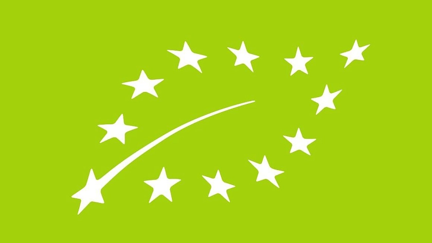 EU-Bio-Logo: aus 12 Sternen stilisiertes Blatt auf grünem Hintergrund
