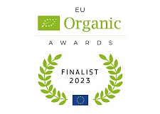 Auf dem Bild ist das Logo der EU Organic Awards zu sehen: Grüne Blätter in einem Kreis mit dem Text EU Organic Awards.